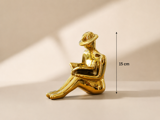 Golden reading man